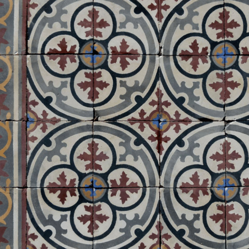 A cleaned section of an antique carreaux de ciments floor of 20cm sq tiles