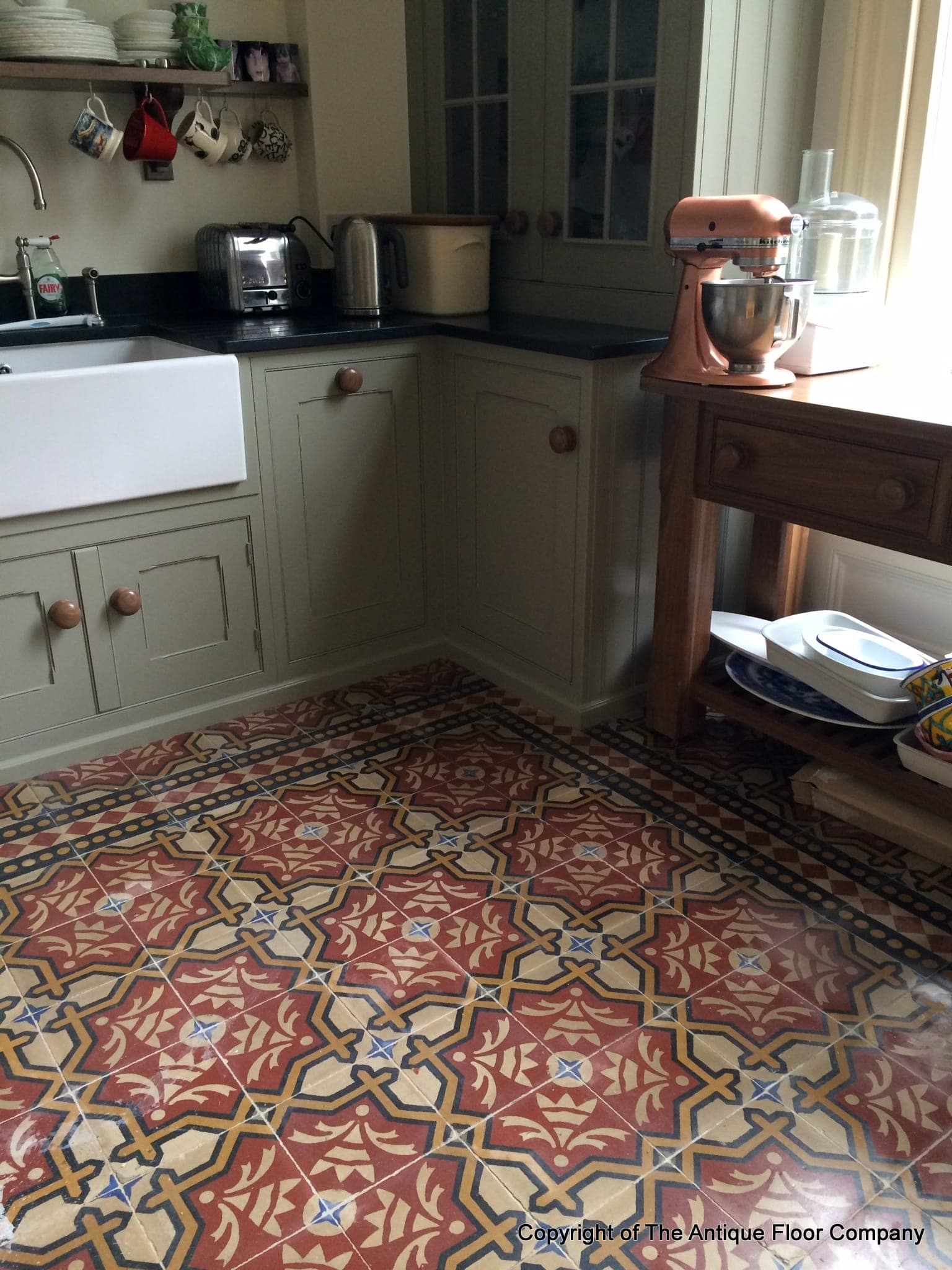 Two antique carreaux de ciment floors adding warmth and colour in this ...