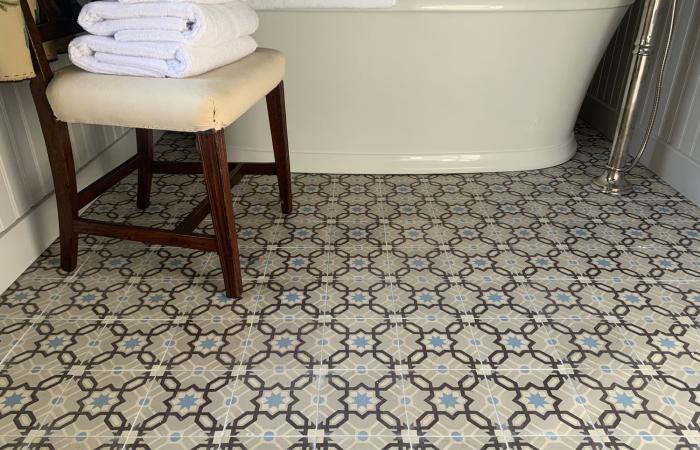 A 1913 Octave Colozier ceramic in a Massachusetts bathroom 