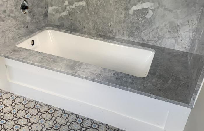 A 1913 Octave Colozier ceramic in a Massachusetts bathroom 