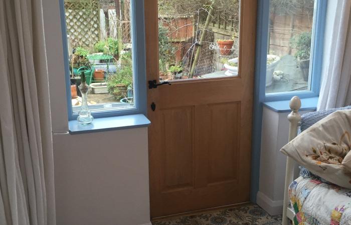 A period French ceramic floor in a London conservatory and bathroom