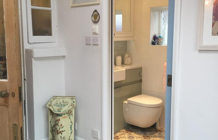 A period French ceramic floor in a London conservatory and bathroom