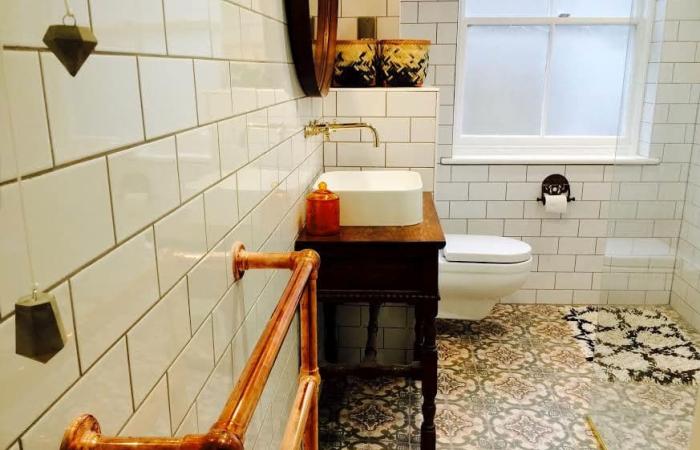 Art Nouveau floor tiles in this London bathroom