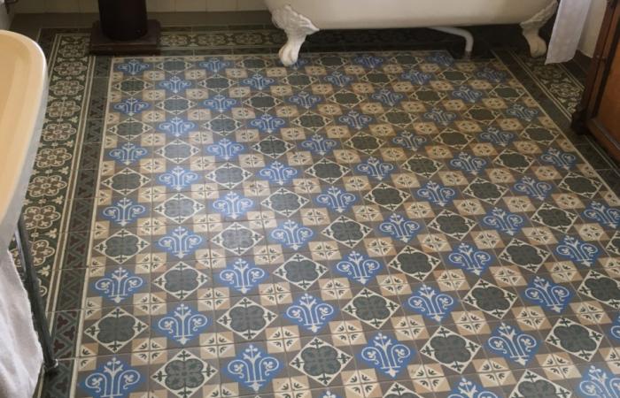 An antique Belgian ceramic in a Swedish country house bathroom