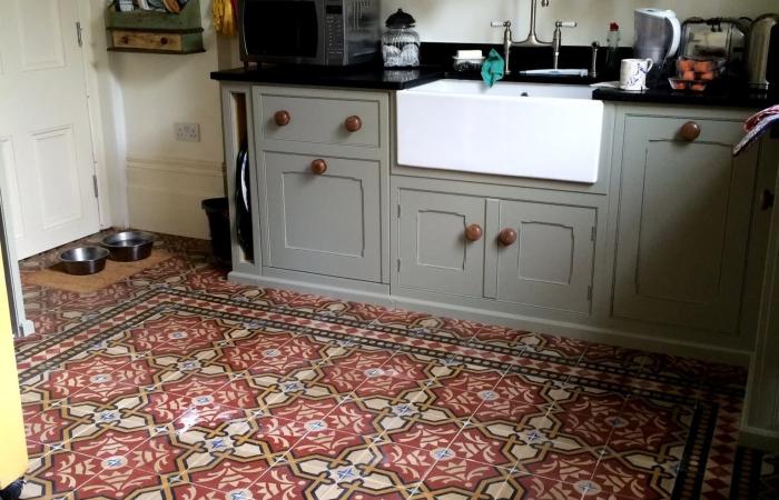 Two antique carreaux de ciment floors adding warmth and colour in this North London home.