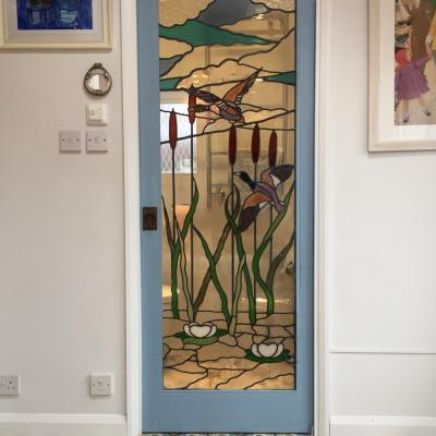 A period French ceramic floor in a London conservatory and bathroom