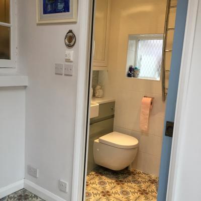 A period French ceramic floor in a London conservatory and bathroom