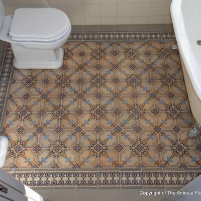 A period octagon ceramic with cabochons in a Gotland, Sweden bathroom 