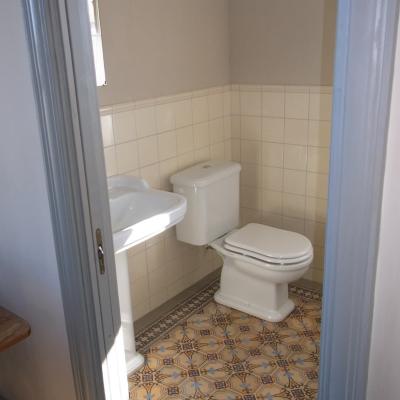 A period octagon ceramic with cabochons in a Gotland, Sweden bathroom 