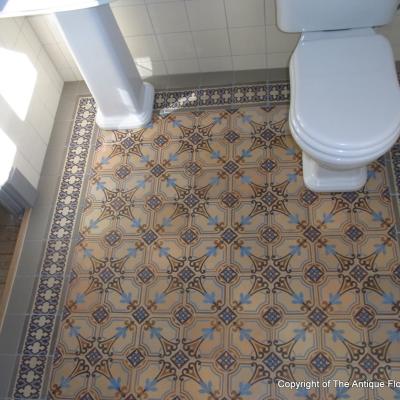 A period octagon ceramic with cabochons in a Gotland, Sweden bathroom 