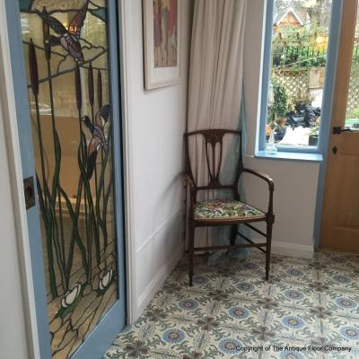 A period French ceramic floor in a London conservatory and bathroom