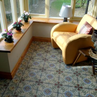 A thistle themed ceramic in a charming English conservatory