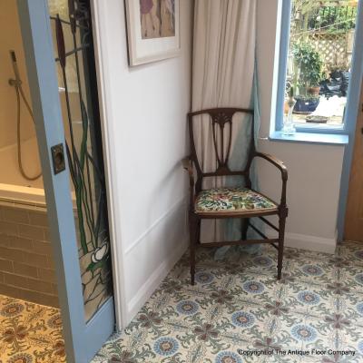 A period French ceramic floor in a London conservatory and bathroom