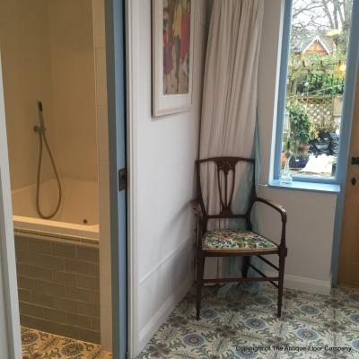 A period French ceramic floor in a London conservatory and bathroom