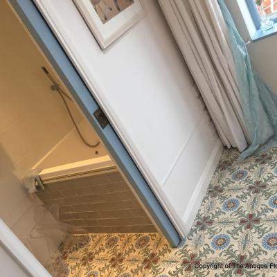 A period French ceramic floor in a London conservatory and bathroom