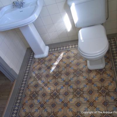 A period octagon ceramic with cabochons in a Gotland, Sweden bathroom 