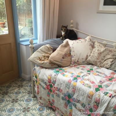 A period French ceramic floor in a London conservatory and bathroom