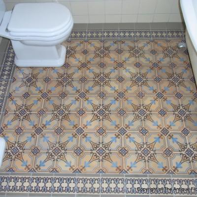 A period octagon ceramic with cabochons in a Gotland, Sweden bathroom 