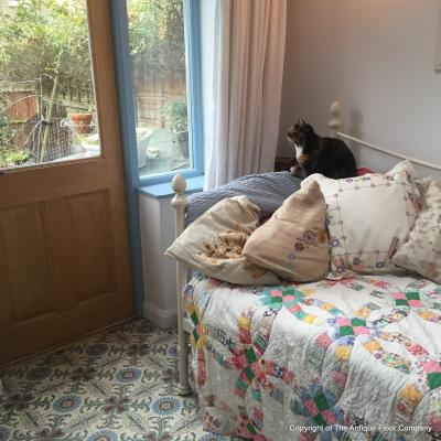 A period French ceramic floor in a London conservatory and bathroom