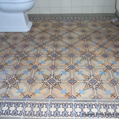 A period octagon ceramic with cabochons in a Gotland, Sweden bathroom 