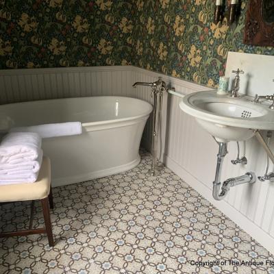 A 1913 Octave Colozier ceramic in a Massachusetts bathroom 