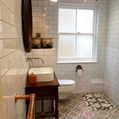 Art Nouveau floor tiles in this London bathroom