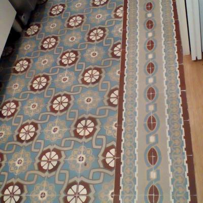 An antique ceramic floor in the kitchen of a Paris apartment