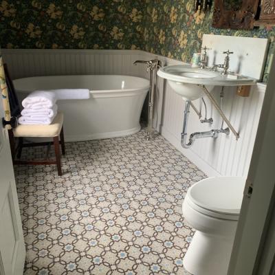 A 1913 Octave Colozier ceramic in a Massachusetts bathroom 