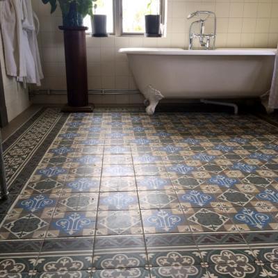 An antique Belgian ceramic in a Swedish country house bathroom