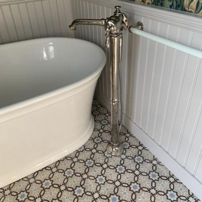 A 1913 Octave Colozier ceramic in a Massachusetts bathroom 