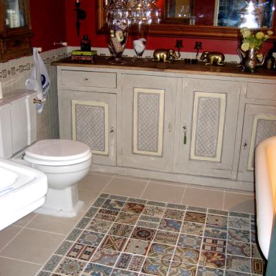 A patchwork floor bathroom in London