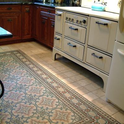 A stunning art nouveau floor in a kitchen in Brooklyn