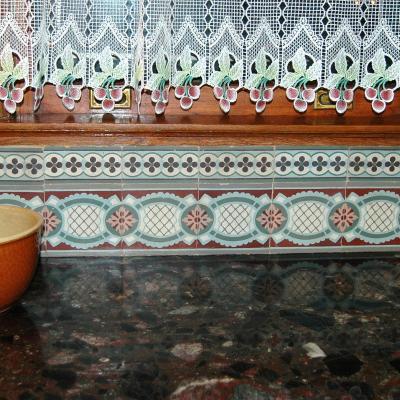 A stunning art nouveau floor in a kitchen in Brooklyn