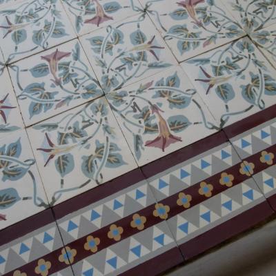 A pretty period floral ceramic with a strong geometric border
