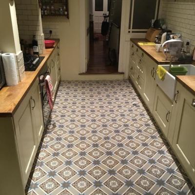 Two fine examples of an antique French ceramic in their new kitchens