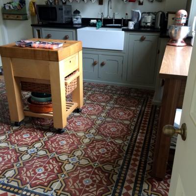 Two antique carreaux de ciment floors adding warmth and colour in this North London home.