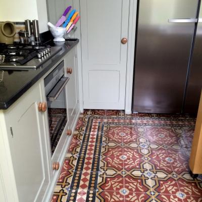 Two antique carreaux de ciment floors adding warmth and colour in this North London home.