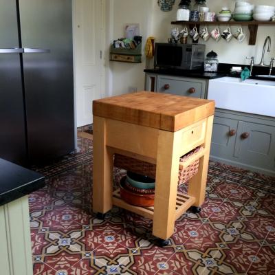 Two antique carreaux de ciment floors adding warmth and colour in this North London home.