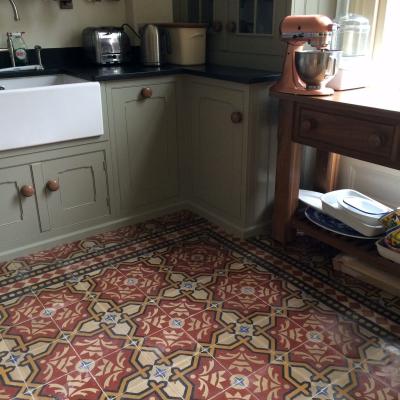 Two antique carreaux de ciment floors adding warmth and colour in this North London home.