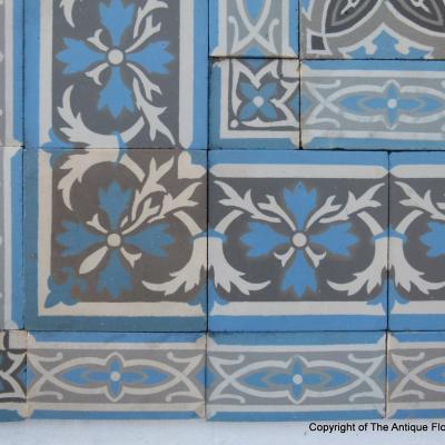 A small triple border antique French ceramic floor