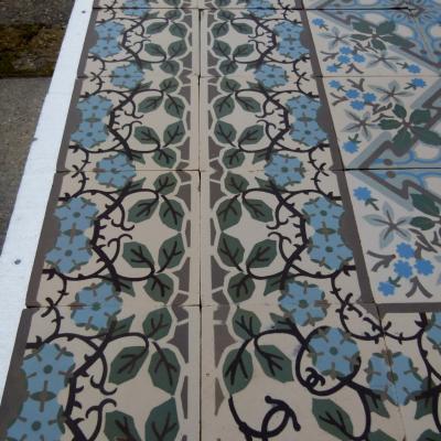 Large +/- 22.75m2 antique ceramic floor with same size border tiles