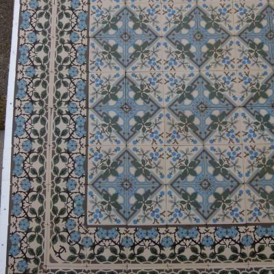 Large +/- 22.75m2 antique ceramic floor with same size border tiles