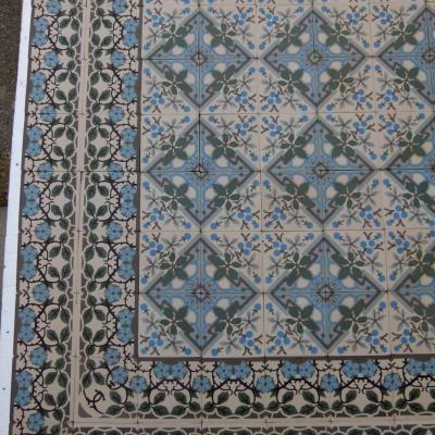 Large +/- 22.75m2 antique ceramic floor with same size border tiles