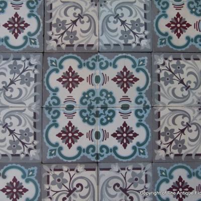 A small, 5m2, three motif antique French ceramic