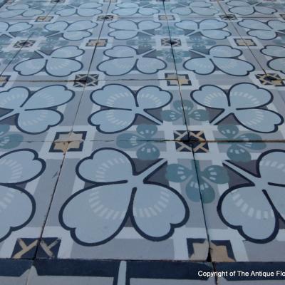 A small antique French clover themed floor c.1905