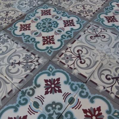 A small, 5m2, three motif antique French ceramic