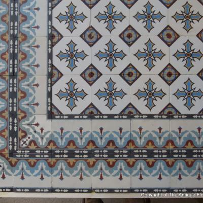 A c.15.3m2 to 19m2 classically French antique ceramic with double borders