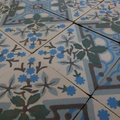 Large +/- 22.75m2 antique ceramic floor with same size border tiles