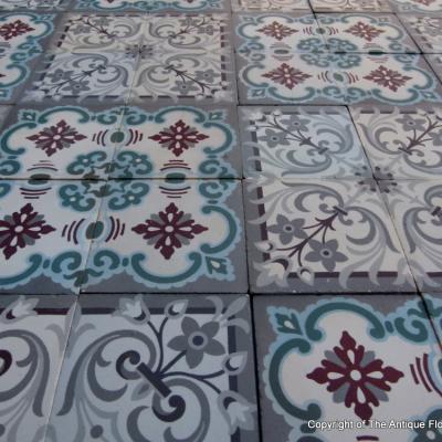 A small, 5m2, three motif antique French ceramic