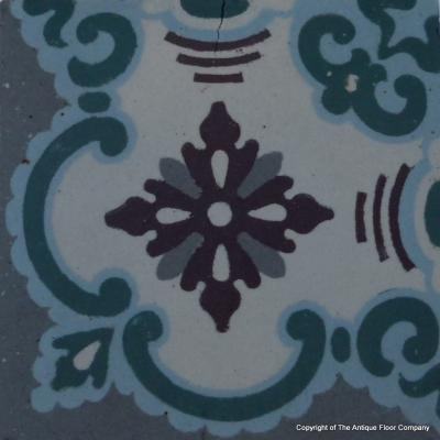 A small, 5m2, three motif antique French ceramic